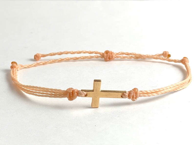 blush peach with gold cross