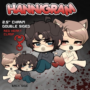 May include: A 2.5-inch double-sided Hannigram charm featuring two chibi-style characters with masks, one with dark hair and one with light hair and animal ears. Includes a red heart-shaped clasp and text reading Hannigram, 2.5 inch charm double sided.