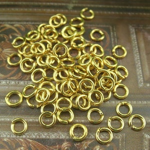 200 pcs 0.7 x 3mm Golden Plated Jumpring. image 2