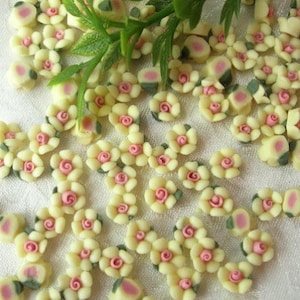 15pcs forget me not ceramic 6mm, yellow w/ pink centre