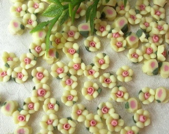 15 pcs forget me not ceramic 6mm, yellow w/ pink centre