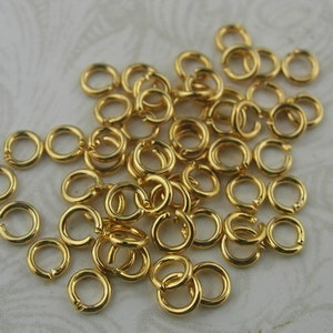 200 pcs 0.7 x 3mm Golden Plated Jumpring. image 1