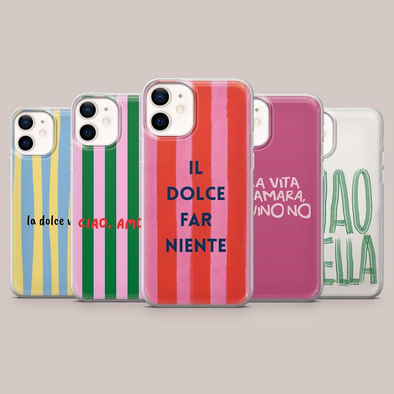 May include: A collection of five phone cases with colorful striped designs and Italian phrases. The cases feature vertical stripes in various colors, including blue, pink, and red. Each case has a different Italian phrase printed on it.