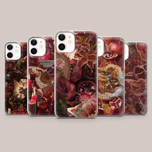 May include: A collection of five phone cases with unique designs. Each case features a different collage of floral elements, pomegranates, and text. The color palette includes shades of red, burgundy, and cream, creating a vintage aesthetic.