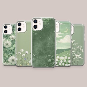 Peut inclure: Cinq coques de téléphone avec des motifs sur le thème de la nature. Les coques présentent diverses nuances de vert et des illustrations de marguerites, de fleurs sauvages, d'un paysage avec une lune et des motifs abstraits. Les coques sont en plastique transparent.