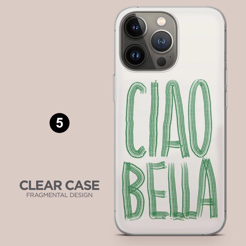 May include: Clear phone case with the words "CIAO BELLA" in green, handwritten-style lettering. The case is transparent, allowing the phone's color to show through. The case also has a camera cutout.