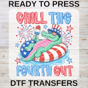 May include: A DTF transfer design featuring a green alligator wearing a patriotic top hat and sunglasses, lounging on a red, white, and blue striped inner tube while holding a popsicle. The text reads CHILL THE FOURTH OUT with fireworks.