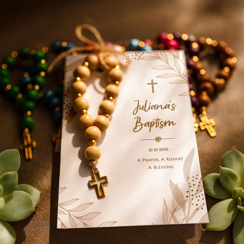 Natural baptism gift card, featuring a natural wooden rosary and gold cross charm, displayed on a soft and warm background. A Catholic baptism and first communion keepsake.