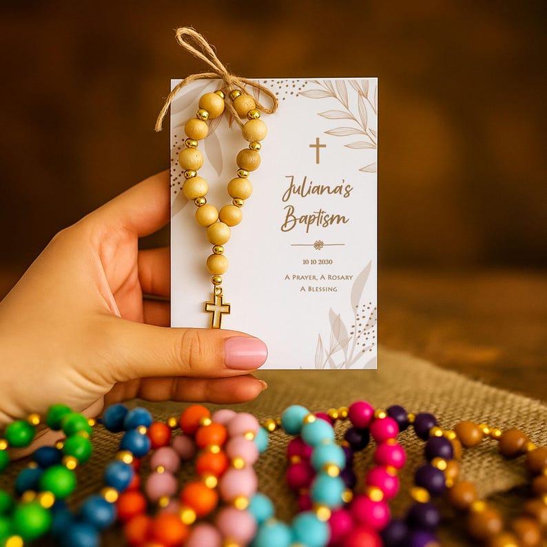 Natural baptism gift card, featuring a natural wooden rosary and gold cross charm, displayed on a soft and warm background. A Catholic baptism and first communion keepsake.