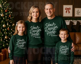 May include: A family of four wearing matching dark green sweatshirts with the text "Your Design Here" in white script. The family is posing in front of a Christmas tree and a fireplace.