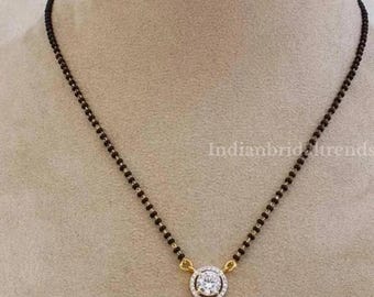 Collar nupcial de plata de ley con cuentas negras y diamantes de circonita cúbica.