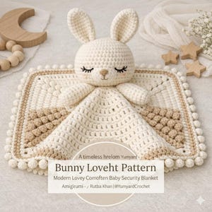 May include: A cream-coloured crochet bunny lovey security blanket. The bunny has closed eyes and long eyelashes. The blanket is square with a textured pattern and a border of small cream-coloured pom-poms. The text "Bunny Loveht Pattern" is visible.