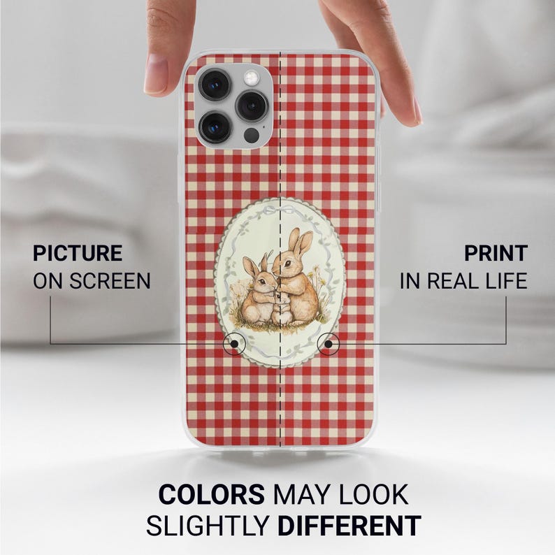 May include: A phone case with a red and white gingham pattern. The case features an oval illustration of two rabbits. The text on the case reads "Picture on Screen" and "Print in Real Life". The text "Colors May Look Slightly Different" is also visible.