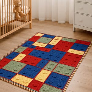 May include: A colorful, rectangular rug with a Lego block design. The rug features red, blue, yellow, and green squares with raised circular details. The rug is approximately 48 inches long and 36 inches wide.
