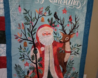 Merry Christmas Quilted Wall Hanging or Throw.  Cozy up or show it off.  it measures 42 X 52, just the perfect size.  Quilted in a snowflake