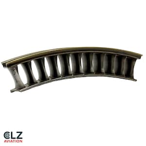 May include: A curved, metallic aircraft part with multiple vertical blades. The part has a dark, aged appearance with a gold-colored trim along the top edge. The logo "CLZ AVIATION" is visible in the bottom left corner.