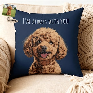 May include: A navy blue square throw pillow featuring a detailed illustration of a brown poodle with a pink tongue. The text "I'M ALWAYS WITH YOU" is printed in white. A small image of the dog is in the upper left corner.
