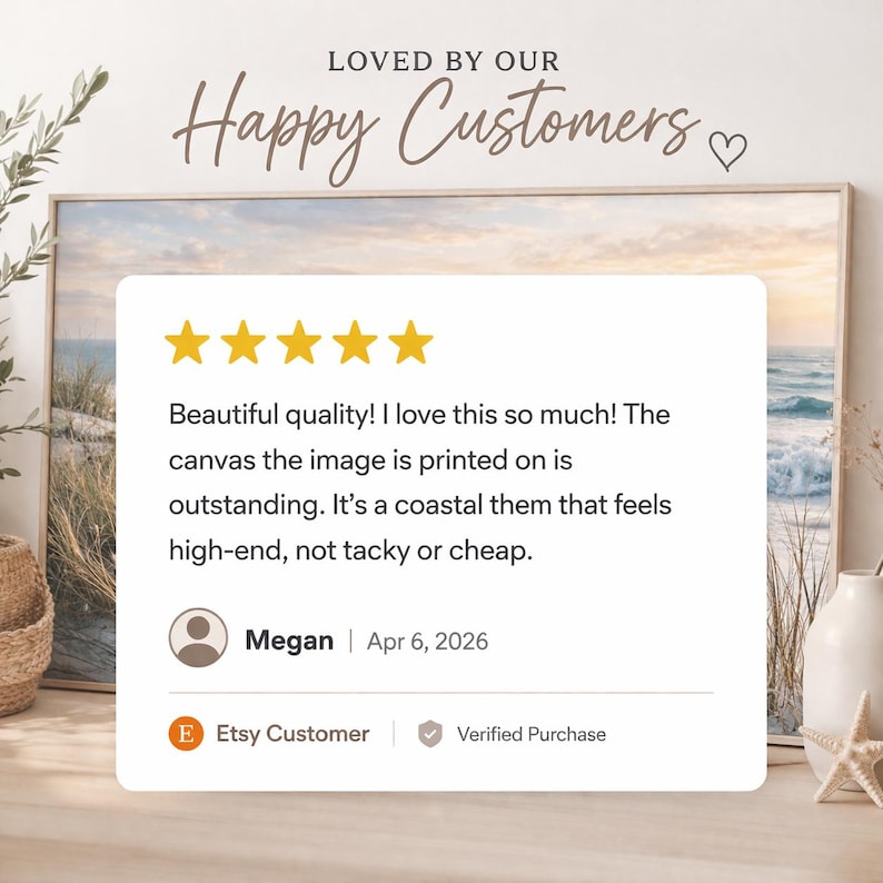 The image is a framed photograph of a coastal scene, with a starfish and a vase of flowers on a table. The text in the image reads "LOVED BY OUR Happy Customers" and "Megan | Apr 6, 2026", indicating that the image is a review of the artwork.