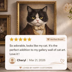 A framed portrait of a black and white cat wearing a brown suit and bow tie, with a 5-star rating and a customer review expressing their love for the cat.