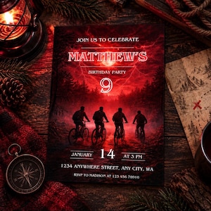 Peut inclure: Une carte d'invitation d'anniversaire rectangulaire montrant une forêt rouge sombre avec quatre personnes à vélo sous une lune rouge et des éclairs. Le texte indique : JOIN US TO CELEBRATE MATTHEW'S BIRTHDAY PARTY 9 JANUARY 14 AT 3 PM 1234 ANYWHERE STREET, ANY CITY, WA RSVP TO MADISON AT 123 456 78910.