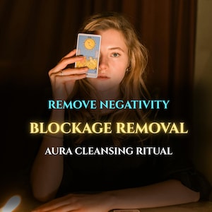 May include: A person holding a tarot card with a sun illustration in front of their face. The image has text that reads "REMOVE NEGATIVITY", "BLOCKAGE REMOVAL", and "AURA CLEANSING RITUAL". The background is dark.