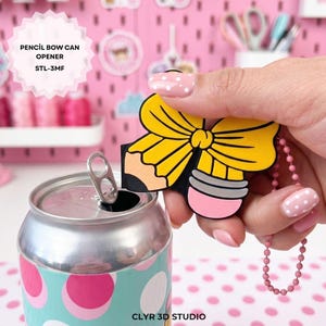 May include: A yellow bow-shaped pencil can opener with a pink eraser and a silver pull tab opening a can. The can has a teal background with pink and white polka dots. The text "PENCIL BOW CAN OPENER STL-3MF" is visible.