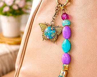 Llavero de mariposa con borla: llavero de cuentas hecho a mano, dije colorido para bolso.