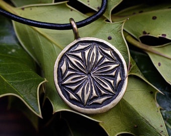 Daisy Wheel pendant hexafoil six petal flower rosette witch mark bronze