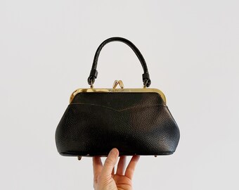 Mid Century Luxury Vintage 50's 60's Pebbled Black Leather Kelly Style Letisse Handbag Purse Bag Kisslock Closure Brass Feet