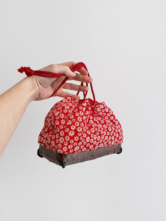 Vintage Japanese bamboo basket purse with drawstring closure combining traditional kago and kinchaku styles