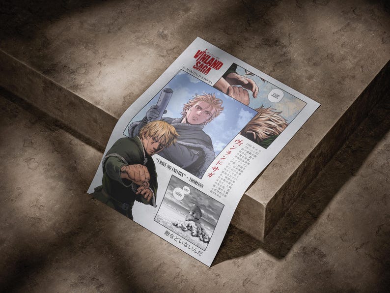 May include: A comic book page featuring panels from the manga series "Vinland Saga." The artwork depicts a blonde-haired character in various action poses. Text includes the series title and Japanese text. The page is set against a textured, neutral background.