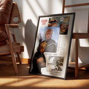 May include: Framed poster featuring panels from the manga series Vinland Saga. The artwork depicts characters with blonde hair and action scenes. Text in English and Japanese is visible. The poster is leaning against a wooden shelf.