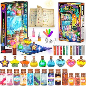 May include: A fairy potions kit with 22 potion-making ingredients. The kit includes various colorful bottles, glitter, charms, and a guide. The packaging features the text "Fairy Potions Make Your Own". The bottles are filled with colorful liquids and glitter.