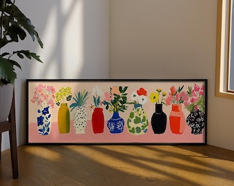 May include: A framed artwork featuring a row of colorful vases, each holding a different arrangement of flowers. The vases vary in shape, color, and pattern, including blue, yellow, red, and black. The background is a soft pink, and the frame is black.