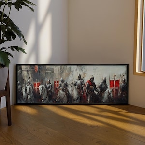 May include: A framed artwork depicting medieval knights on horseback. The painting features knights in silver armor, some with red capes and banners. The background shows a castle and a cloudy sky, creating a historical theme.