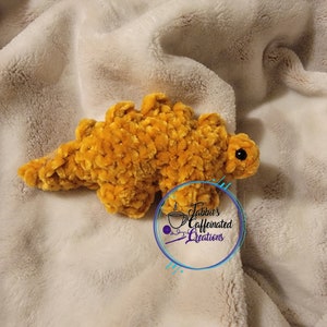 dino chicken nuggies crochet physical item Stegosaurus