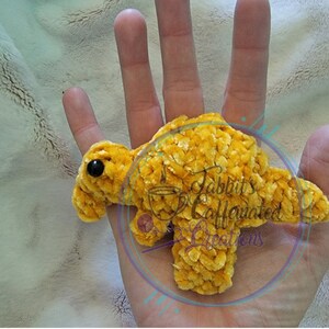 dino chicken nuggies crochet physical item Spinosaurus