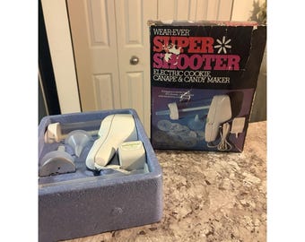 Pistola eléctrica para comida Wear Ever 70001 Super Shooter, prensa para galletas, sin libro, 8 discos GUC