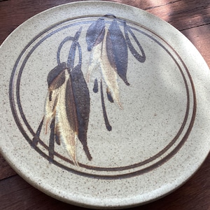 Studio pottery wall plate or trivet