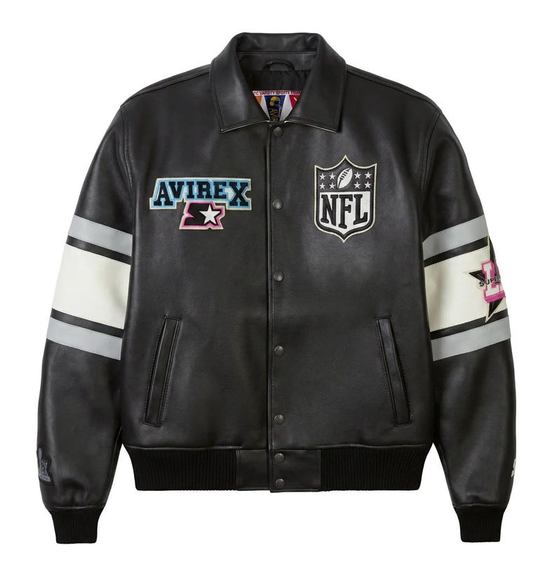 May include: Black leather jacket with white and gray stripes on the sleeves. Features the Avirex and NFL logos, along with other patches. The jacket has a button-up front and a collar.