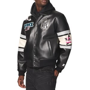 May include: Black leather jacket with a button-up front, featuring patches with the NFL logo, the word "AVIREX", and a star design. The jacket has white and gray stripes on the sleeves and a black ribbed collar and cuffs.
