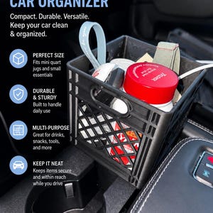 May include: A black mini quart jug crate car organizer, shown inside a car's console. The crate is filled with various items, including a red-topped container. Text on the image reads: "MINI QUART JUG CRATE CAR ORGANIZER."
