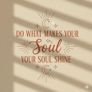 May include: A beige background with the text "DO WHAT MAKES YOUR Soul YOUR SOUL SHINE" in a reddish-brown color. The design includes sun and moon illustrations with stars.