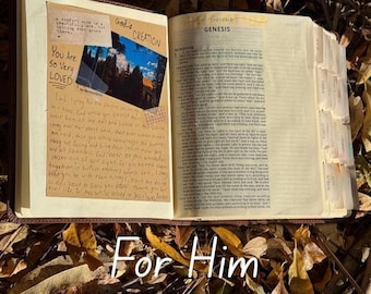 May include: Open Bible with handwritten notes and a landscape image. The text includes "You Are So Very LOVED" and "God's CREATION". The word "Genesis" is visible. The phrase "For Him" is at the bottom.