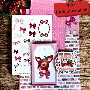 May include: A Christmas junk journal kit featuring pink and white designs. The kit contains bow stickers, a tag with a deer illustration, and patterned paper. The text "4 oz Junk Journal kit" is displayed on the packaging.