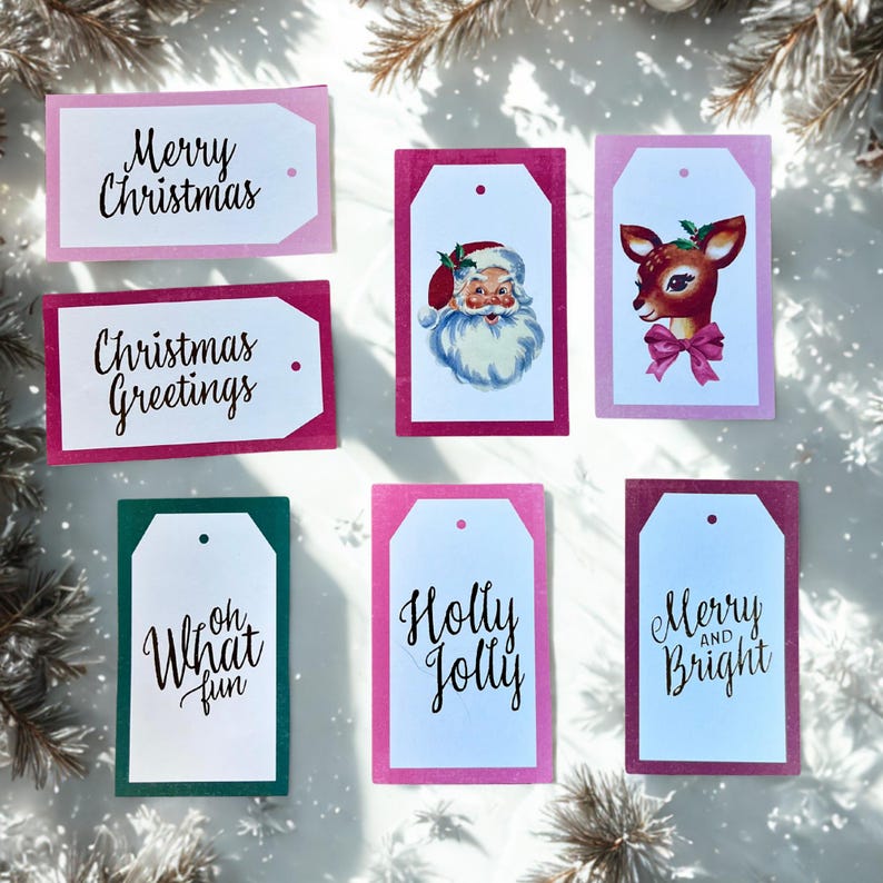 May include: A selection of Christmas gift tags in shades of pink, green, and red. The tags display seasonal greetings such as "Merry Christmas" and "Merry and Bright", alongside illustrations of Santa and a deer. Each tag has a hole.