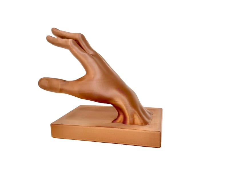 dali inspired hand bookend modern bookshelf decor