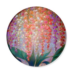 May include: A circular decorative plate featuring a vibrant, painterly illustration of cascading lily of the valley flowers in shades of pink, purple, orange, and white, set against a shimmering, iridescent background with dark green foliage at the base.