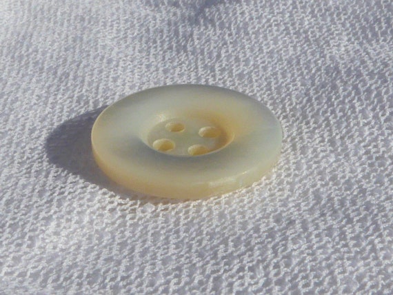 Mother of Pearl Button Raised Edge 4 Hole Mother of Pearl Button Raised Edge 4 Hole