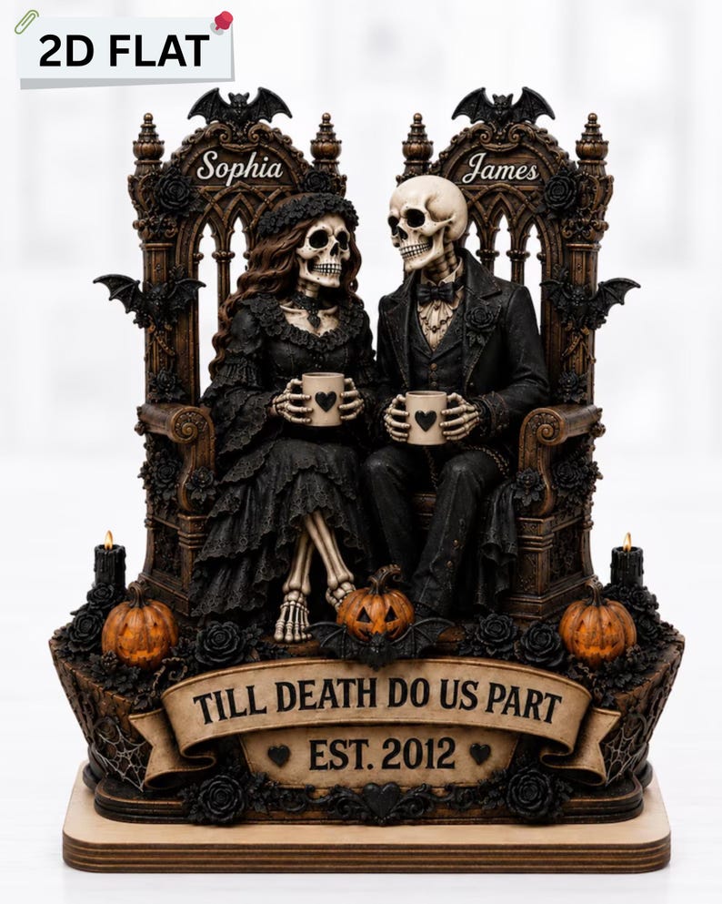 May include: A decorative figurine featuring two skeletons seated on ornate thrones, holding mugs with heart icons. The female skeleton wears a black dress and the male wears a black suit. A banner reads TILL DEATH DO US PART EST. 2012 with names Sophia and James.